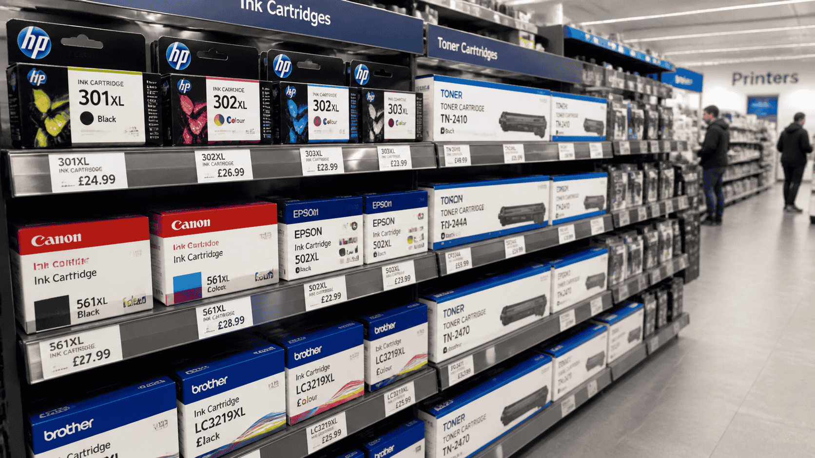 A variety of printer cartridges displayed on shelves in a well-known UK electronics store